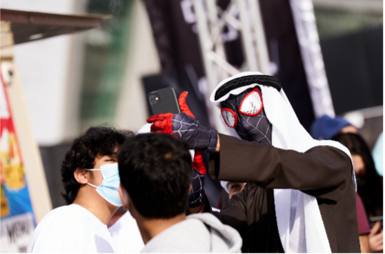 Black Spiderman taking selfie at the Middle East Comic Con 2022